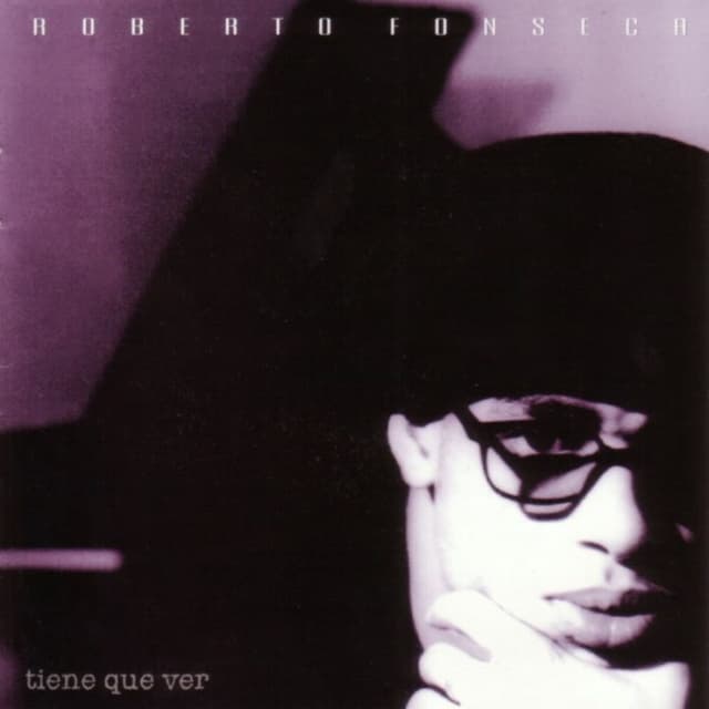 Album cover art for Tiene Que Ver