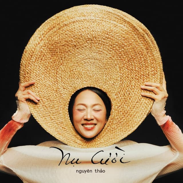 Album cover art for Nụ Cười