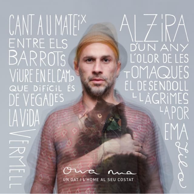 Album cover art for Un gat i l’home al seu costat
