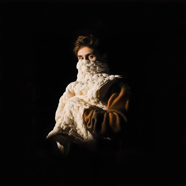 Album cover art for QUE LOVE