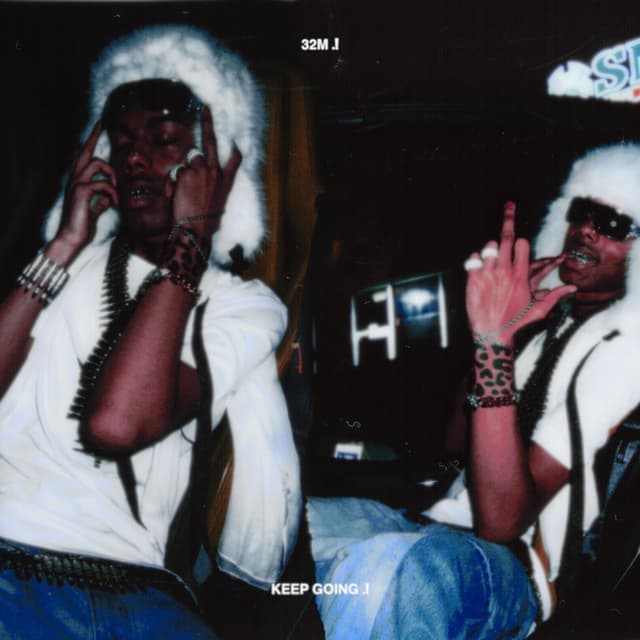 Album cover art for 32M / KEEP GOING .!
