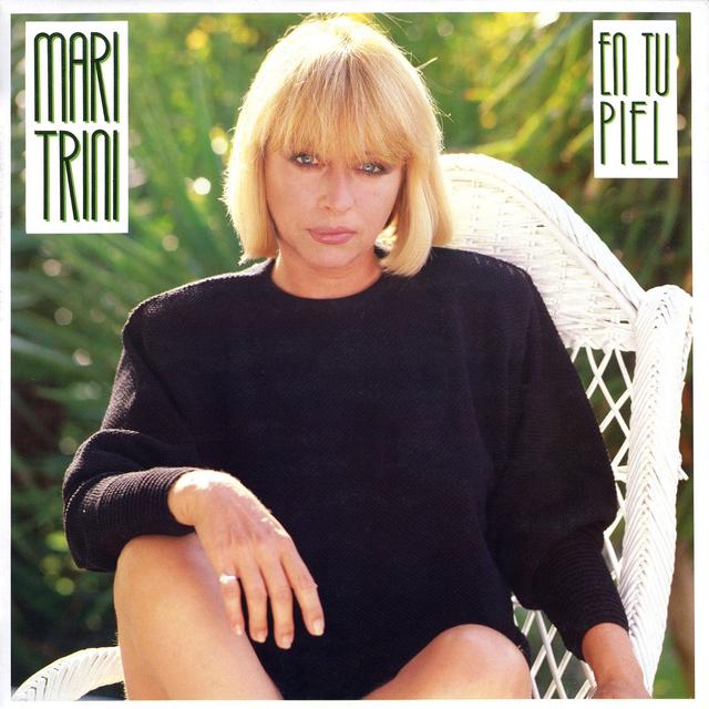 Album cover art for En Tu Piel