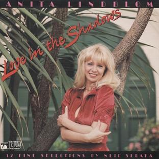 Album cover art for Love in the Shadows 12 Fine Selections by Neil Sedaka